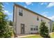View of the home's exterior and the charming backyard area at 14027 Clayborn St, Midland, NC 28107