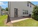 Exterior backyard view with a concrete patio area for outdoor entertaining at 14027 Clayborn St, Midland, NC 28107