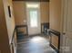 Welcoming entryway featuring stylish flooring and decorative wall paneling at 15005 Savannah Hall Dr # 72, Charlotte, NC 28273