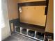 Functional mudroom area with a storage bench, hooks, and storage baskets for organization at 15005 Savannah Hall Dr # 72, Charlotte, NC 28273
