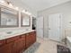 Bathroom with double vanity, a separate toilet room, and shower/tub at 159 Autumn Mist Rd, Statesville, NC 28677