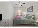 Cozy bedroom with neutral walls, ceiling fan, and comfortable furnishings for a relaxing retreat at 159 Autumn Mist Rd, Statesville, NC 28677