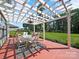 Patio area with elegant pergola and outdoor dining table set for alfresco meals and relaxed gatherings at 159 Autumn Mist Rd, Statesville, NC 28677
