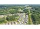 Neighborhood aerial showing property's location close to commercial areas; identified address of 1736 Rhynes Trail at 1736 Rhynes Trl, Rock Hill, SC 29732