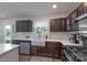 Well-appointed kitchen features stylish cabinetry and ample counter space at 1736 Rhynes Trl, Rock Hill, SC 29732