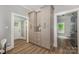 Kitchen featuring pantry and bar area between hallways at 201 Valley St, Stanley, NC 28164