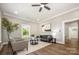 Comfortable living room featuring new floors, recessed lighting and natural light at 201 Valley St, Stanley, NC 28164
