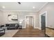 Comfortable living room featuring hardwood floors, recessed lighting and lots of space at 201 Valley St, Stanley, NC 28164