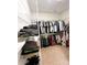 Spacious walk-in closet with ample storage and organization options for wardrobe and accessories at 205 Spring Creek Dr, Mount Holly, NC 28120