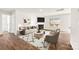 A modern living room features a fireplace, plush seating, and stylish decor, creating a welcoming space at 221 Brenett Francis Ct, Charlotte, NC 28214