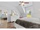 Bedroom featuring an accent wall and a view to living area, offering natural light and comfort at 237 Mariposa Rd, Stanley, NC 28164