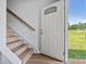 Bright, welcoming entrance featuring a modern white door with decorative glass at 237 Mariposa Rd, Stanley, NC 28164