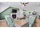 Open-concept living space with stylish furnishings, a fireplace, and a view of the kitchen at 237 Mariposa Rd, Stanley, NC 28164