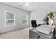 Bright office space featuring natural light, modern furnishings, and neutral carpeting at 237 Mariposa Rd, Stanley, NC 28164