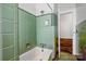 Bathroom featuring vintage green tile, patterned floor, and shower at 2417 Statesville Blvd, Salisbury, NC 28147