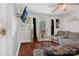 Bright living room featuring hardwood floors, a large window, and comfortable seating at 2417 Statesville Blvd, Salisbury, NC 28147