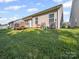 Home and deck in large, grassy backyard with shady lawn at 24604 Blue Heron Cir, Lancaster, SC 29720