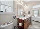 Bathroom featuring a vanity with double sinks, large mirror and natural light at 24604 Blue Heron Cir, Lancaster, SC 29720