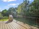 Open deck with views of backyard and wooded area at 24604 Blue Heron Cir, Lancaster, SC 29720