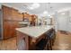 Spacious open kitchen with granite countertops, stainless steel appliances, and kitchen island with seating at 24604 Blue Heron Cir, Lancaster, SC 29720