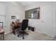 Home office with neutral carpet, natural light, desk, and comfortable seating at 24604 Blue Heron Cir, Lancaster, SC 29720