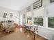 Cozy sunroom featuring multiple windows, natural light, and hardwood floors at 24604 Blue Heron Cir, Lancaster, SC 29720