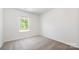 Bedroom with neutral carpet and a window at 3001 Sadler Woods Ln, Charlotte, NC 28214