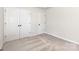 This bedroom features neutral carpet, and standard closet storage at 3005 Sadler Woods Ln, Charlotte, NC 28214