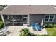 Relaxing backyard featuring an outdoor patio with furniture and lounge chairs at 320 Secretariat Dr, Iron Station, NC 28080