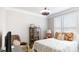 Cozy bedroom with natural light, charming decor, and a comfortable queen-size bed, perfect for relaxation at 320 Secretariat Dr, Iron Station, NC 28080