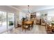 Inviting dining room with a round table, stylish light fixture, and sliding glass door to the patio at 320 Secretariat Dr, Iron Station, NC 28080
