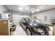 Spacious garage with ample storage space and a modern car at 320 Secretariat Dr, Iron Station, NC 28080