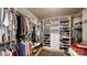 Spacious walk-in closet with custom shelving for clothes, shoes, and accessories providing ample storage at 320 Secretariat Dr, Iron Station, NC 28080