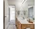 Bathroom featuring oak cabinets and luxury vinyl plank flooring at 325 Hancock Union Ln, Rock Hill, SC 29732