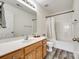 Well-lit bathroom with modern vanity, neutral tones, and ample mirror space at 325 Hancock Union Ln, Rock Hill, SC 29732