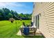 Inviting patio with stylish furniture, perfect for enjoying the lush greenery and outdoor ambiance at 325 Hancock Union Ln, Rock Hill, SC 29732