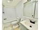 All-white bathroom featuring a tub and shower combo and sleek vanity at 325 Scaley Bark Dr, Salisbury, NC 28147