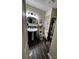 Bathroom with sleek pedestal sink and vanity, complemented by unique camo shower curtain at 3375 Shepherd Rd, Maiden, NC 28650