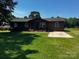 Inviting single-story home features a well-manicured lawn and a welcoming front porch at 3375 Shepherd Rd, Maiden, NC 28650
