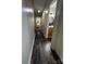 Hallway featuring wood-look floors leading to a bathroom and bedroom at 3375 Shepherd Rd, Maiden, NC 28650
