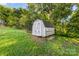 Backyard featuring storage shed and grass at 402 Ford St, Kannapolis, NC 28083