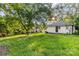 Spacious backyard with a grassy lawn, offering ample space for outdoor activities at 402 Ford St, Kannapolis, NC 28083