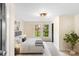 Serene bedroom with plush bedding, natural light, and a calming color palette for ultimate relaxation at 402 Ford St, Kannapolis, NC 28083