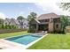 Backyard showcasing a modern pool and lush lawn at 412 Jefferson Dr, Charlotte, NC 28270