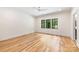 Empty bedroom with hardwood floors, crown molding, a ceiling fan, and natural light at 412 Jefferson Dr, Charlotte, NC 28270