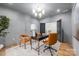 Home office with hardwood floors, modern desk setup, and tasteful decor creating an inspiring workspace at 412 Jefferson Dr, Charlotte, NC 28270