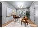 Inviting office space boasts soft gray walls, ample natural light, and stylish decor for a productive workspace at 412 Jefferson Dr, Charlotte, NC 28270