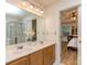Bathroom with double sink vanity and an entry leading into the main bedroom at 4801 Pennant Pl, Charlotte, NC 28212