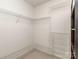 Walk-in closet with wire shelving for easy organization at 4801 Pennant Pl, Charlotte, NC 28212