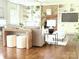 Cozy living room with built-in shelving and a brick fireplace, perfect for relaxing at 5611 Robinhood Rd, Charlotte, NC 28211